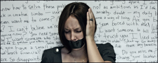 Woman Silenced with Duct Tape, Background of Words
